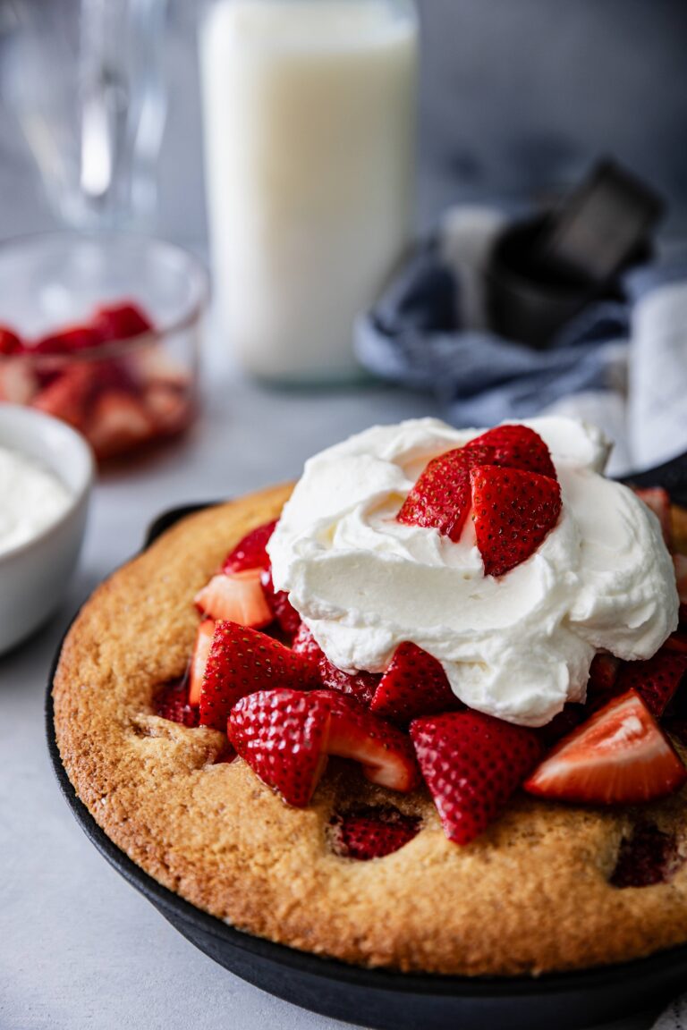 Strawberry Cornmeal Skillet Cake with Muddled Strawberries and Whipped Cream